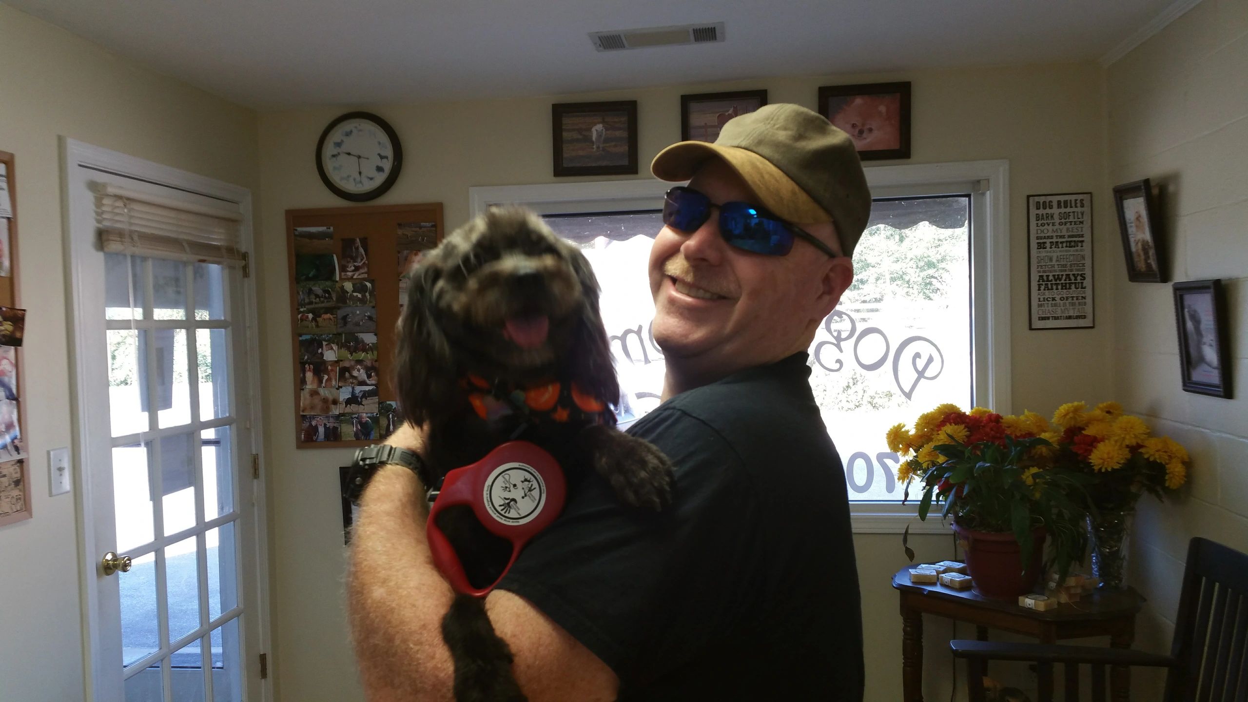 Happy client with black dog