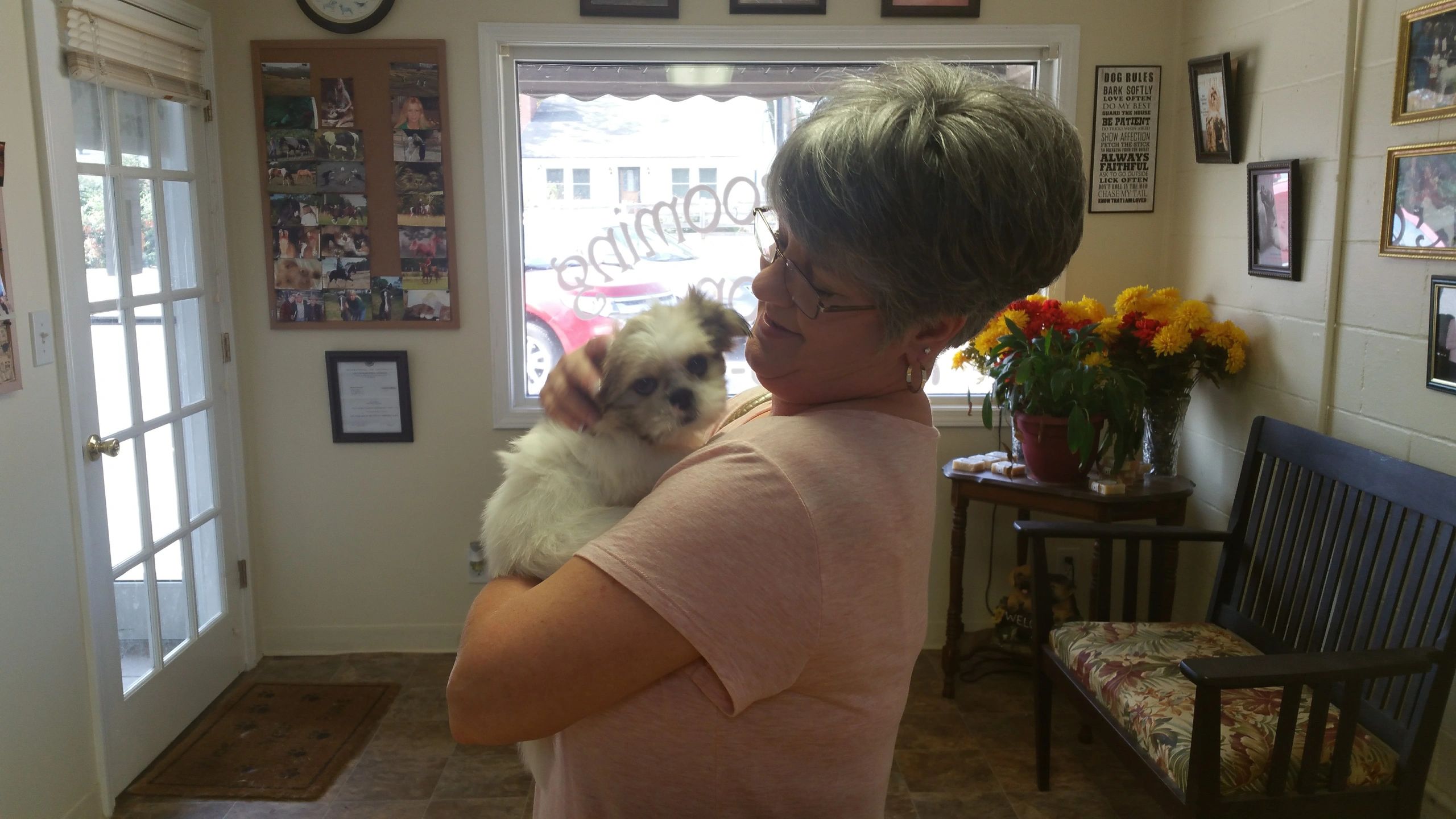 Happy client with fluffy dog